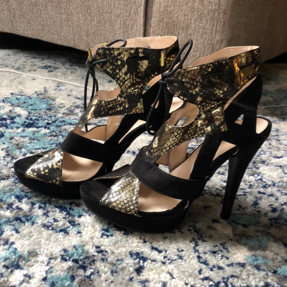Black and gold stiletto heels